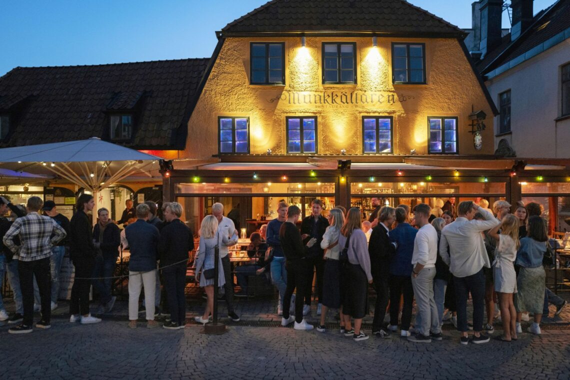 A crowded restaurant in Sweden government intervention Europe government intervention Europe