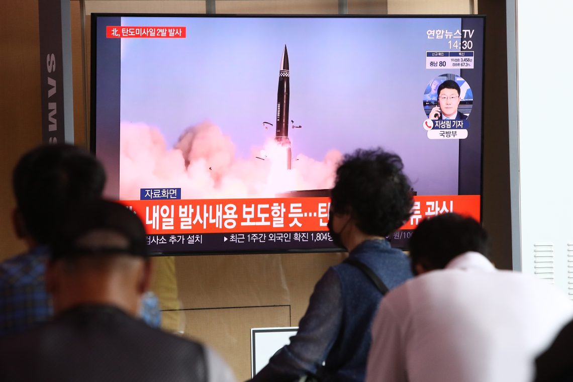 People in Seoul watch footage of a North Korean missile launch