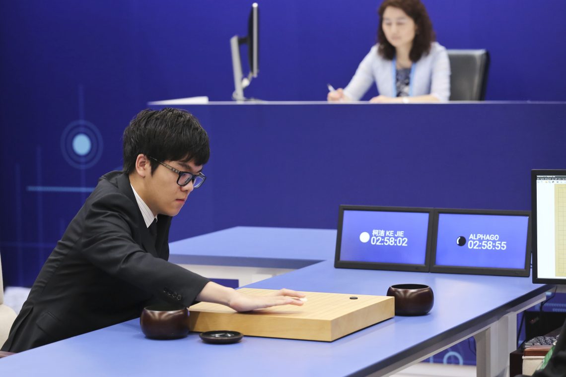 AlphaGo and Ke Jie playing Go (artificial intelligence future))