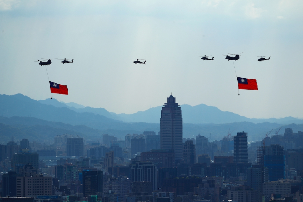 Military helicopters carrying oversized Taiwan flags China Taiwan invasion