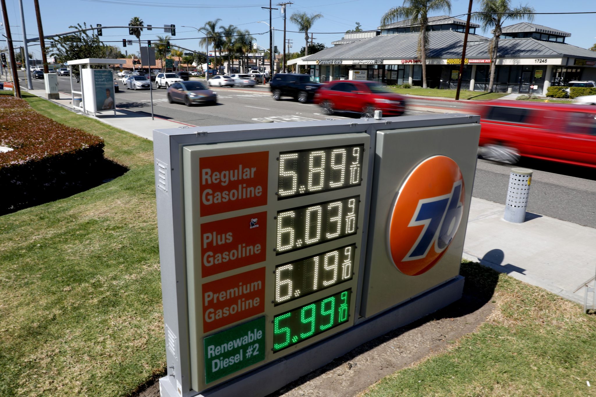 A sign shows gasoline prices in Tustin, California