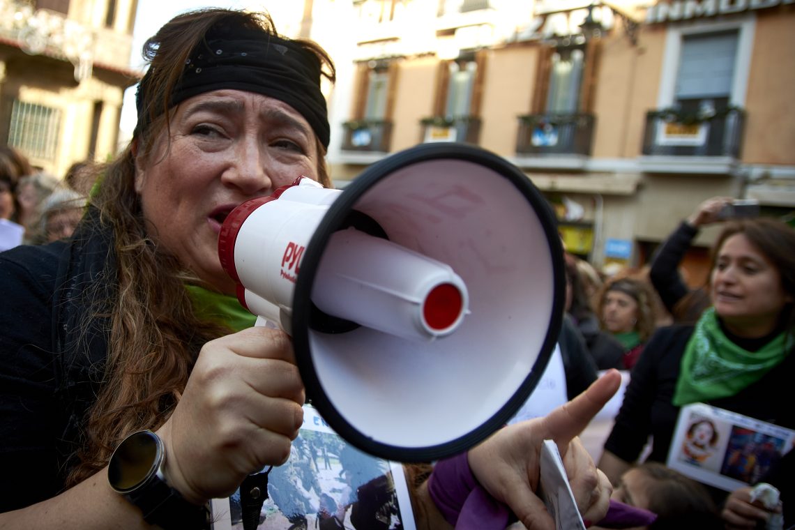 A woman with a loudspeaker