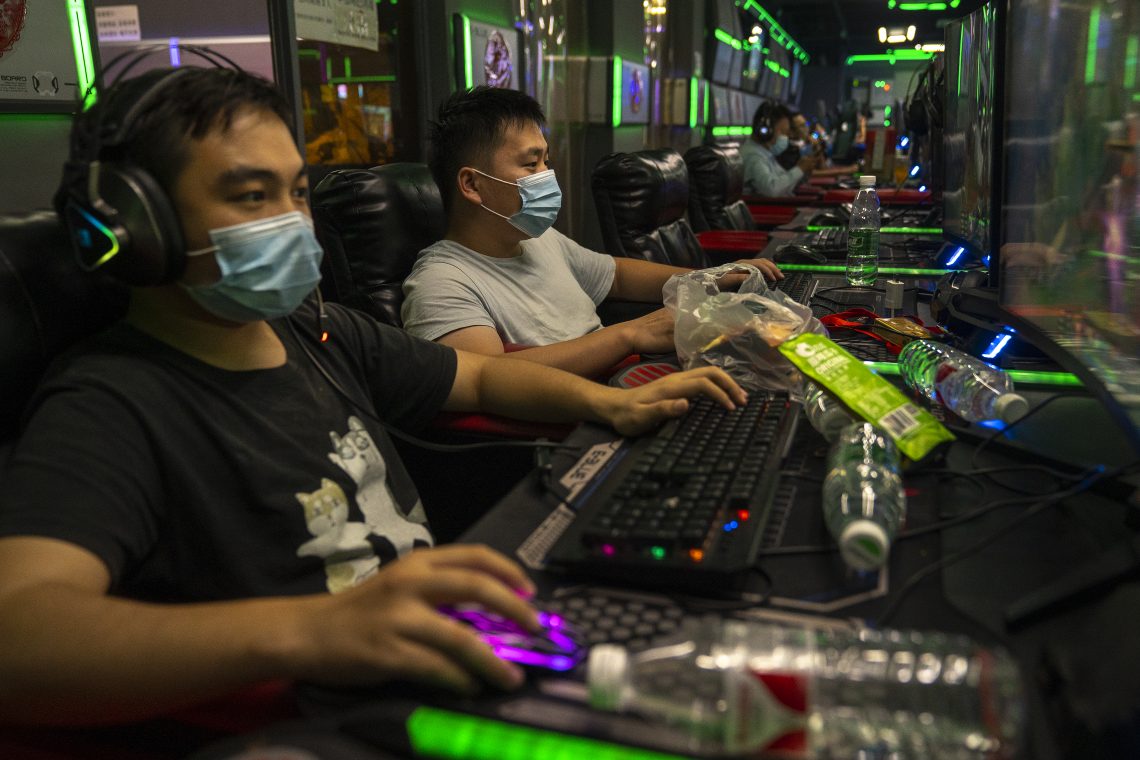 Chinese teenagers playing video games