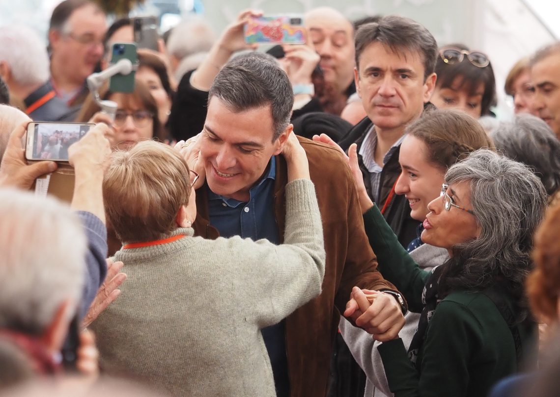 Spanish prime minister hugged