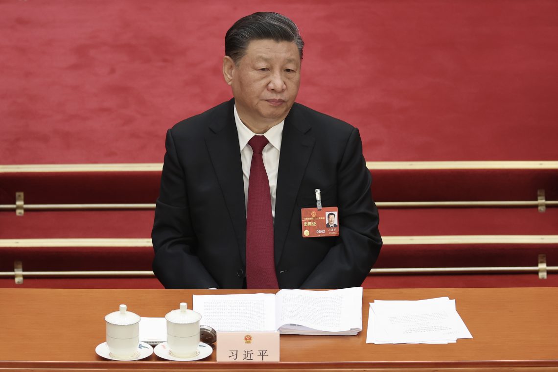 Chinese leader sits