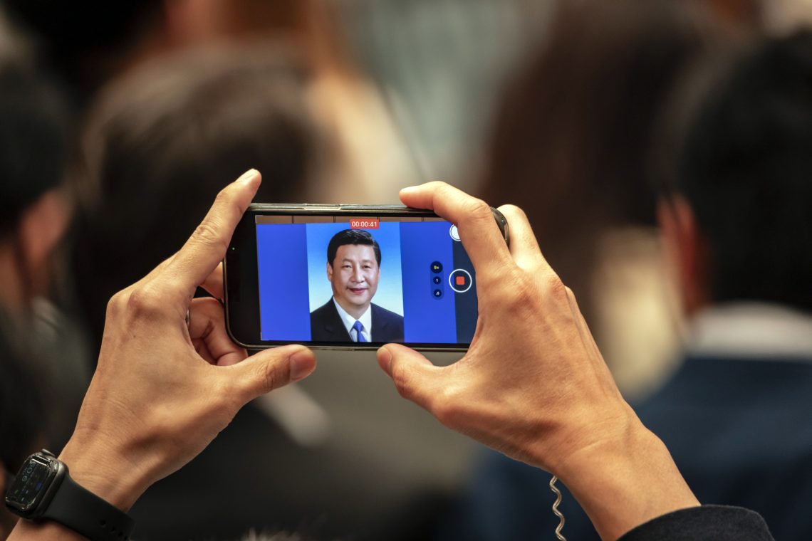 Xi Jinping on a cellphone (china foreign policy)