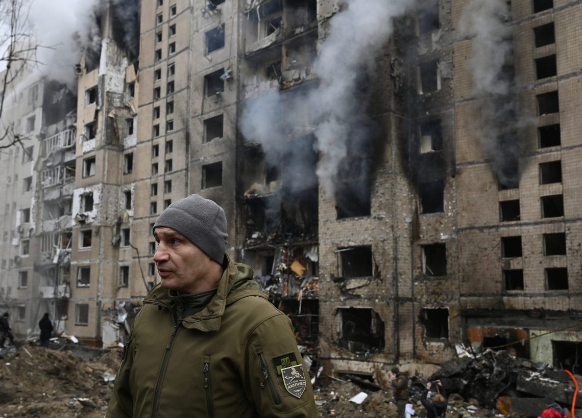 The mayor of Kyiv and a missile-damaged building in Ukraine’s capital city