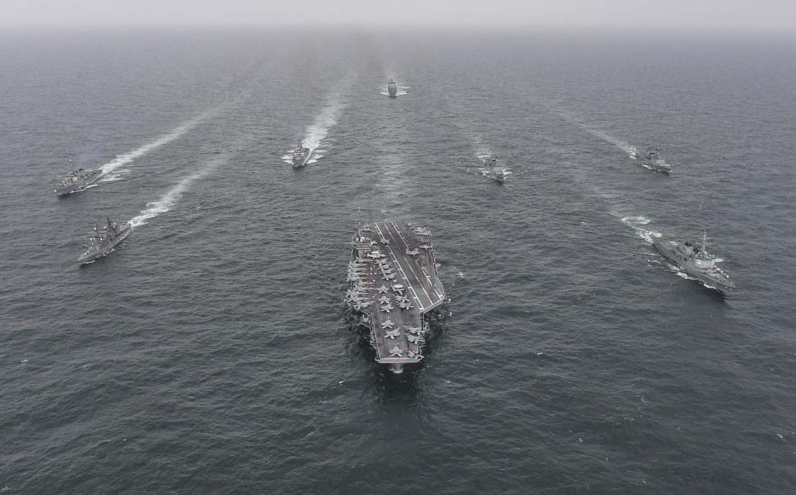 U.S., Japanese and South Korean ships hold naval exercises of the Korean coast.