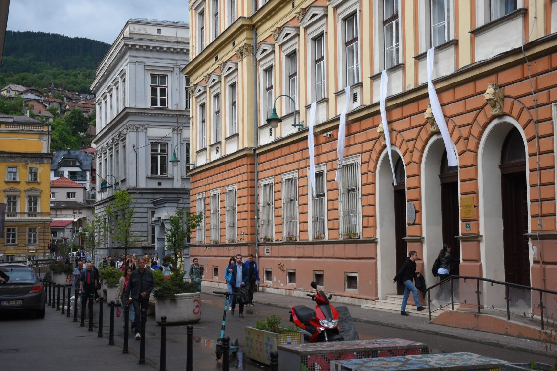 White sheets hang in Sarajevo to commemorate victims of 1992 massacre.