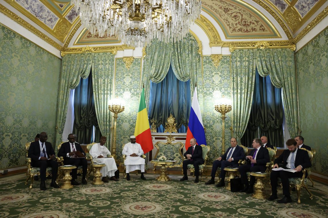 June 23: The leader of Mali's junta, General Assmi Goita (center left), meeting with Russian President Vladimir Putin at the Kremlin on a six-day official visit to Russia.