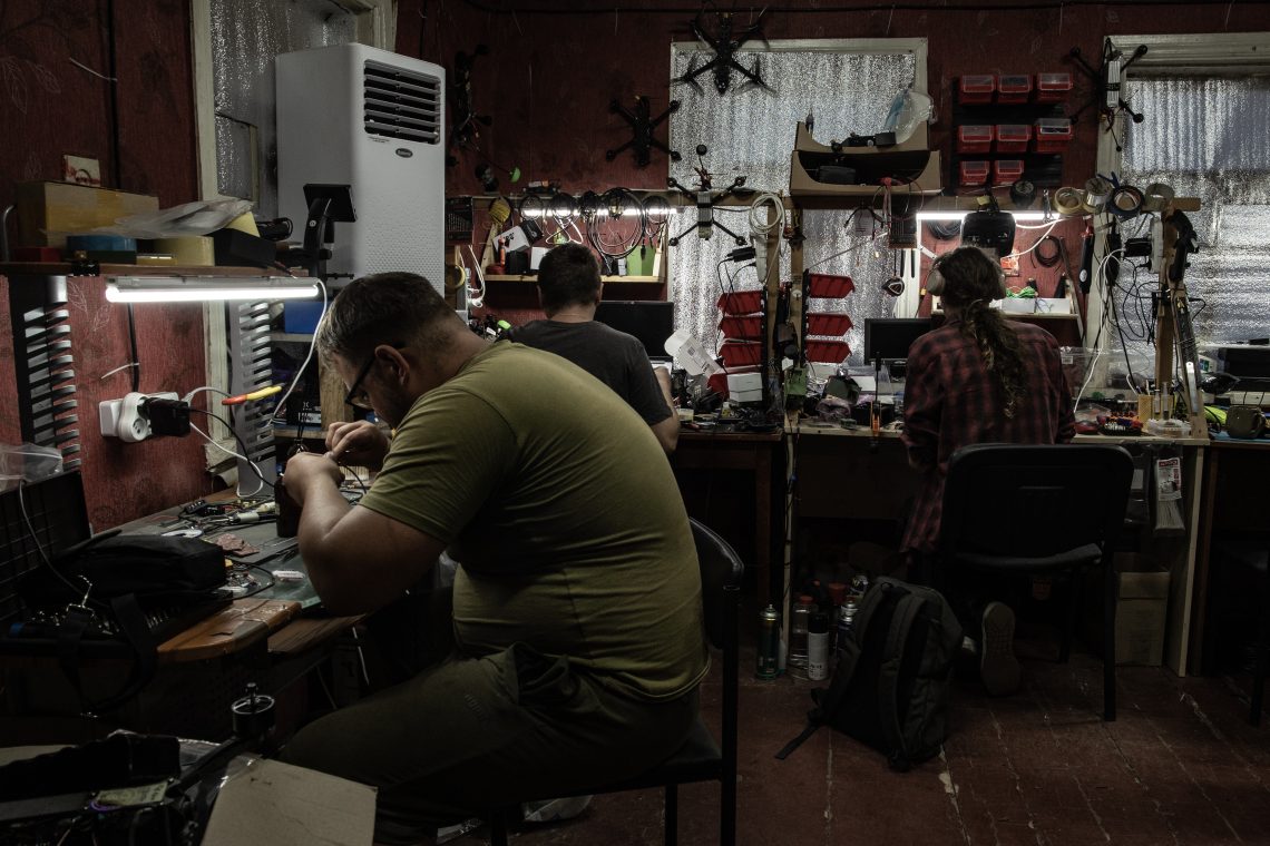 September 12: Ukrainian servicemen soldering microcircuits and assembling FPV drones in an electronics workshop in Donetsk Oblast, Ukraine.